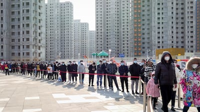 A queue for a Covid-19 test centre in Tianjin on Sunday. Large number of commuters work and live in Tianjin and Beijing. Photo: EPA