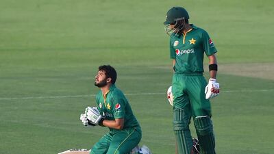 Azhar Ali of Pakistan celebrates scoring a century during the third ODI against West Indies. Tom Dulat / Getty Images / October 5, 2016