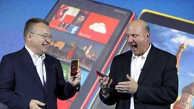 Stephen Elop, the chief executive of Nokia, left, with Steve Ballmer, the chief executive of Microsoft. In Finland, Mr Elop is regarded as a Trojan Horse for Microsoft. Alexander Zemlianichenko Jr / Bloomberg News