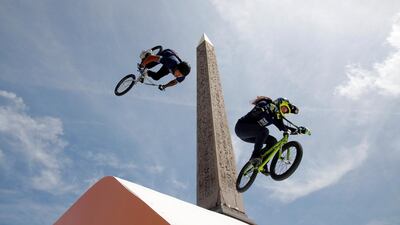 France's BMX team put on a show at Place de la Concorde, which has been turned into a giant Olympic park ahead of the Paris 2024 Olympics, in Paris, France. Reuters