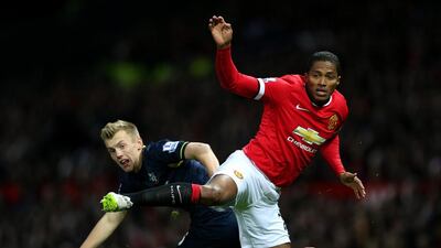 Antonio Valencia of Manchester United battles for the ball with James Ward-Prowse of Southampton during their Premier League match on Sunday. Clive Mason / Getty Images