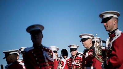 Members of the Marine Band wait for deputy secretary of defense Patrick Shanahan and acting minister of national defense of Afghanistan lieutenant general Tariq Shah Bahrami to participate in an honour cordon outside the Pentagon in Washington, DC. Brendan Smialowski / AFP Photo