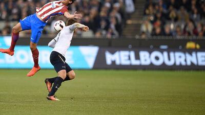 Stefan Savic Atletico de Madrid is tackled by Vincent Janssen of Tottenham Hotspur during 2016 International Champions Cup Australia match between Tottenham Hotspur and Atletico de Madrid at Melbourne Cricket Ground on July 29, 2016 in Melbourne, Australia. (Photo by Vince Caligiuri/Getty Images)