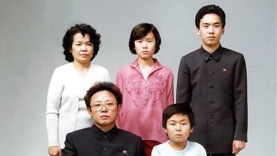 This photo taken 19 August 1981 and recently released shows North Korean leader Kim Jong-il (sitting-L) sitting with his son, Jong-Nam (sitting-R), Kim's sister-in-law Sung Hye-Rang (L-top), Sung's daughter Lee Nam-Ok (C-top) and son Lee Il-Nam (R-top). ???