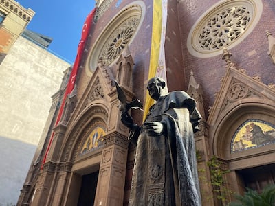 A statue of Pope John XXIII, who died in 1963, outside St Anthony of Padua church. Lizzie Porter / The National