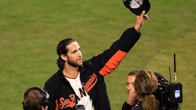 Madison Bumgarner acknowledges the crowd after winning Game 5 for the San Francisco Giants on Sunday night. Jamie Squire / Getty Images / AFP / October 26, 2014