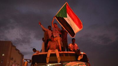 Thousands of Sudanese people celebrate after the signature of the power sharing agreement. EPA/MORWAN ALI