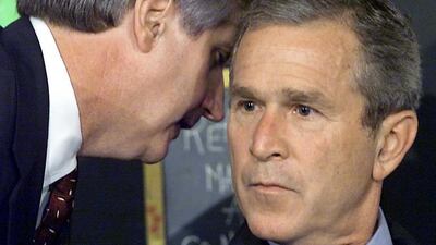 This file photo taken on September 11, 2001, shows chief of staff Andrew Card whispering into US president George W Bush’s ear during a school reading event in Sarasota, Florida, shortly after the World Trade Center towers in New York City were hit by hijacked airplanes. The towers collapsed that day, claiming 2,753 lives. September 11, 2016, marks the fifteenth anniversary of the event. Paul J. Richards / file, AFP