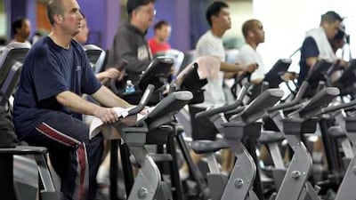 The author says her friends could not convince her to join a gym and she also felt that she would not enjoy the activity. Tony Avelar / AP Photo