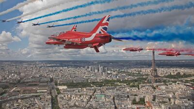 The Royal Air Force Aerobatic Team, the Red Arrows, and the Patrouille De France carry out joint flypasts of both Paris and London. EPA