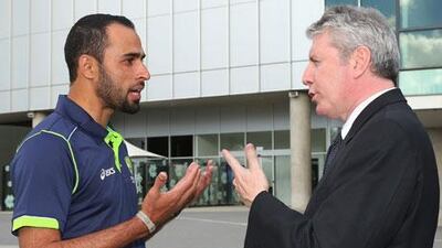 Fawad Ahmed, left, speaking with Brendan O'Connor, a senior Australian government official, will be in action for Australia A. Quinn Rooney / Getty Images