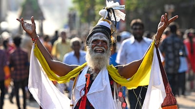 A Hindu devotee gestures during Kapaleeswarar temple's chariot festival in Chennai, India. AFP