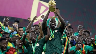 Senegal players celebrate winning the African Cup of Nations 2022. AP