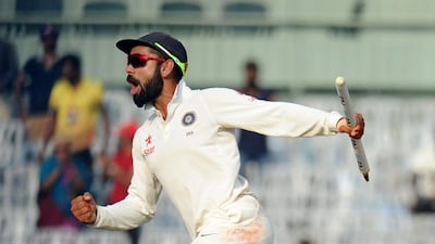 India's cricket captain Virat Kohli celebrates a Test win over England in December 2016. Arun Sankar / AFP
