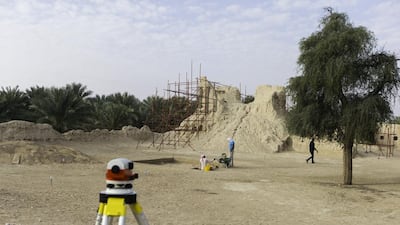 The ruined watchtower at the Bait bin Hadi, which at one time stood guard over the surrounding oasis. The oasis would have been watered by a system of underground tunnels or surface channels built to transport water over many kilometres from aquifers in hills and mountains to lower-lying cultivated areas. This system of aflaj (as falaj are referred to in the plural) was employed in Iran, Iraq and Afghanistan and throughout the Mediterranean, North Africa and in parts of Central Asia. Christopher Pike / The National