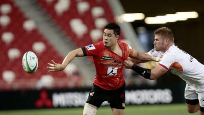 Yu Tamara, left, of the Sunwolves in action against the Central Cheetahs in Super Rugby on Saturday. Wallace Woon / EPA / March 12, 2016