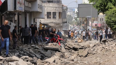 Palestinians inspect the damage after a 10-day Israeli military operation near the West Bank city of Jenin. EPA