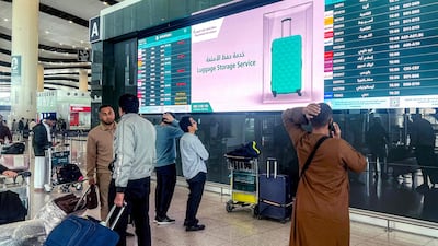 Travellers at King Khalid International Airport in Riyadh. Flight schedules have been disrupted across the Gulf. AFP