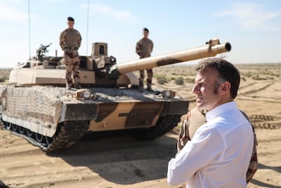 French President Emmanuel Macron during a visit of French military assets in the UAE in December. AFP