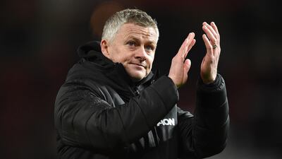 Manchester United manager Ole Gunnar Solskjaer applauds supporters. AFP
