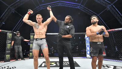 Jack Hermansson of Sweden celebrates after his submission victory over Kelvin Gastelum in their middleweight bout during the UFC Fight Night event inside Flash Forum on UFC Fight Island in Yas Island, Abu Dhabi. Photo by Jeff Bottari / Zuffa LLC via Getty Images