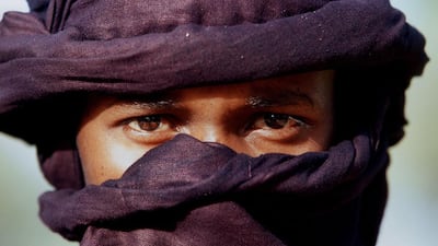 Touareg man in traditional indigo turban, Niger. Henrietta Butler