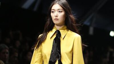 Seventies romance: The 1970s hippie was a key message from the summer collections, and that sweet, romantic mood continued to pervade the autumn/winter runways, as evident in the long, flounced dresses with folkloric prints from Gucci, Gambia by Giambattista Valli and Just Cavalli. The look was stronger in London, on the back of a major retrospective of the 1970s designer Thea Porter; nevertheless, there were lovely Victorian-style floor-grazing, printed dresses with high necks that were popular during that era. Roberto Cavalli’s main collection was inspired by Mick Jagger’s 1970s glam-rock phase, with long-sleeved, flounced silk blouses in acid colours teamed with slinky hip-hugging flares (pictured). Reuters