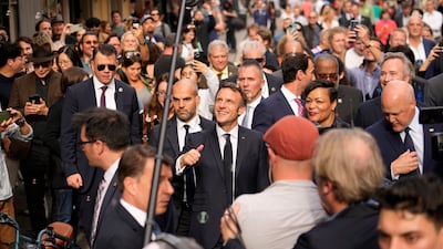 A sea of people followed Mr Macron as he made his way through the French Quarter. AP