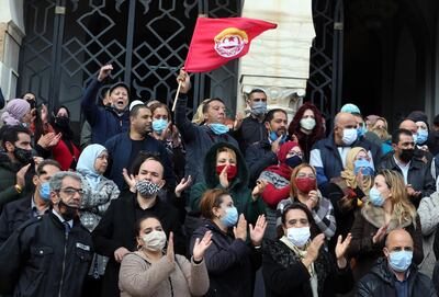 Tunisian clerks and justice officials take part in a demonstration, demanding better working conditions outside a court in Tunis, Tunisia on 24 November 2020. EPA