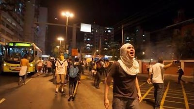 A protester shouts during an anti-government protest in Rio de Janeiro's sister city, Niteroi, Brazil.