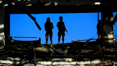 Yemeni Houthi rebel fighters stand guard. AFP