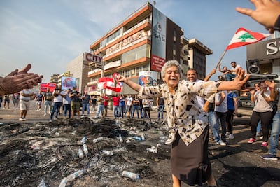 Blanche Eid's joyful 'The Next Day', showing a woman dancing on October 18, 2019, day two of the uprisings in Jounieh. Courtesy of the artist