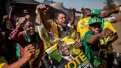 Supporters of Zimbabwe's President Emmerson Mnangagwa celebrate in the capital Harare on August 3, 2018. AFP