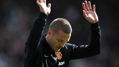 Nemanja Vidic waves to the crowd after his final match with Manchester United on May 11, 2014 against Southampton. Glyn Kirk / AFP