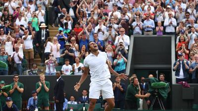 Jo-Wilfried Tsonga screams in delight after defeating John Isner 19-17 in the fifth set of their third round match. Julian Finney / Getty Images