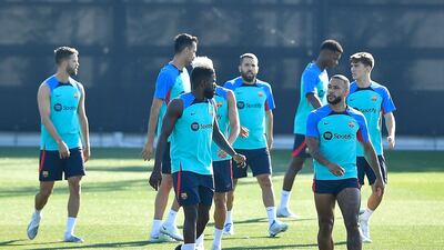 Barcelona's Dutch forward Memphis Depay, right, during a squad training session. AFP