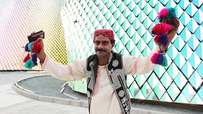 Gul Bahar has been pulling in an audience with his folk dancing at the Expo 2020 Dubai's Pakistan pavilion. Pawan Singh / The National