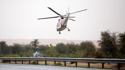 A medical helicopter attends an accident in the UAE. The US domestic medical and tourist aircraft manufacturer Air Methods has agreed to be bought. Christopher Pike / The National