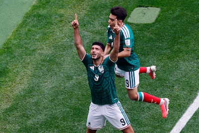 Mexico's forward Raul Jimenez celebrates scoring his team's second goal during the match between Mexico vs South Africa at the Mexico City Stadium. AFP