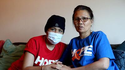 Chemotherapy is becoming ineffective for Michelle Lordan, left, with her mother. She needs to have a bone-marrow transplant operation in the US, which is not available in the UAE. Satish Kumar / The National