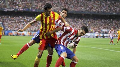 Led by David Villa, right, Atletico Madrid have proved tough competitors for Barcelona. Andres Kudacki / AP Photo
