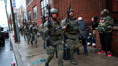 Police officers arrive at the scene of an active shooting in Jersey City, New Jersey, on December 10, 2019. AFP