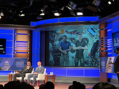 Steve Harvey and Yousef Al Otaiba, UAE ambassador to the US, during a live call with UAE astronaut Sultan Al Neyadi and Nasa's Woody Hoburg in Washington. Willy Lowry / The National
