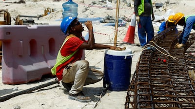 A worker drinks water on a construction site in Dubai. Many jobs are adaptable, and a great deal of building and roadworks take place after sunset during the summer, reducing the harm posed by high temperatures and sun exposure. Reuters
