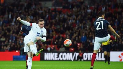 Wayne Rooney of England scores his team’s second goal. Shaun Botterill / Getty Images