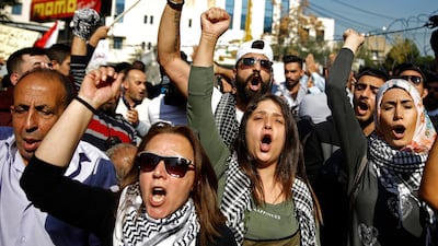 People protest against what they called 'America’s intervention in Lebanon’s affairs,' near the US embassy outside Beirut yesterday. AP