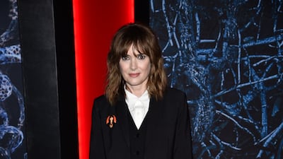 Winona Ryder in a three-piece suit at the premiere of 'Stranger Things' season 4 at Netflix Studios Brooklyn on Saturday, May 14, 2022, in New York. AP