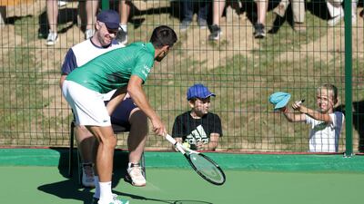 Serbian tennis player Novak Djokovic performs during the opening of a regional tennis centre that will prepare top tennis players for major tournaments, in Visoko, Bosnia and Herzegovina. Reuters