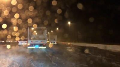 Traffic drives through floodwater on the E11 between Abu Dhabi and Dubai during the storm on November 11, 2018. Courtesy Gabriella Moore