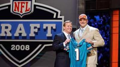 Last season's first pick. Michigan's Jake Long, right, here with NFL commissioner Roger Goodell, was selected by the Miami Dolphins.
